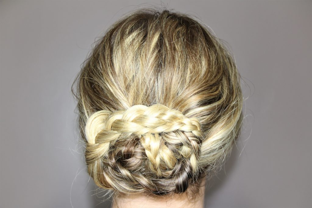 Blonde wraparound braid in a bun from the back