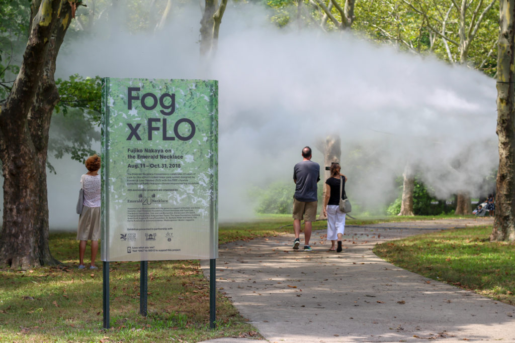 people walking through the Fog x FLO exhibit by Fujiko Nakaya at the Emerald Necklace