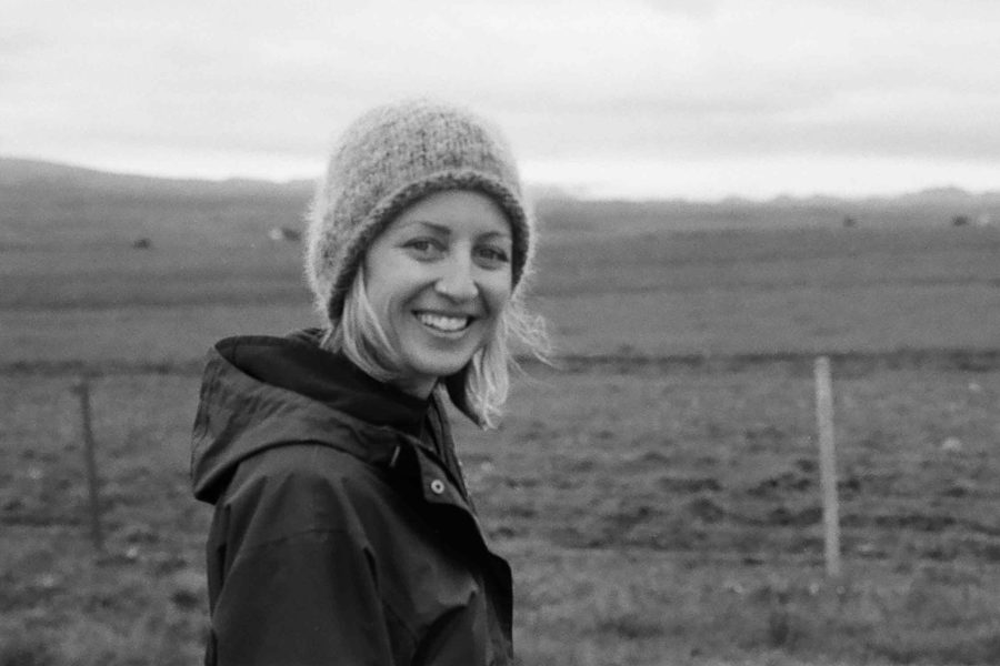 Black and white photo of Learning Beautiful founder and CEO Kim Smith with winter hat and jacket