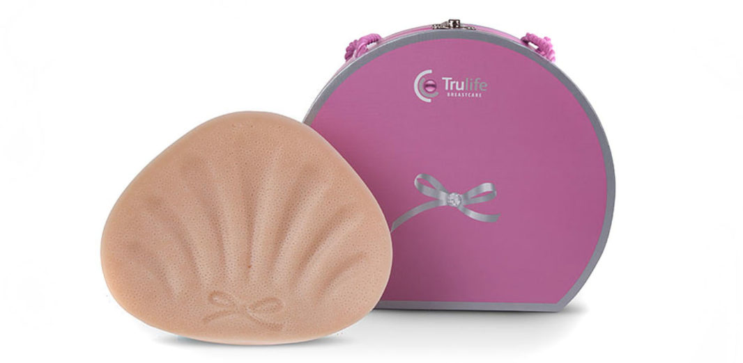 Back of Trulife Sublime Arís Breast Form and fuchsia case 