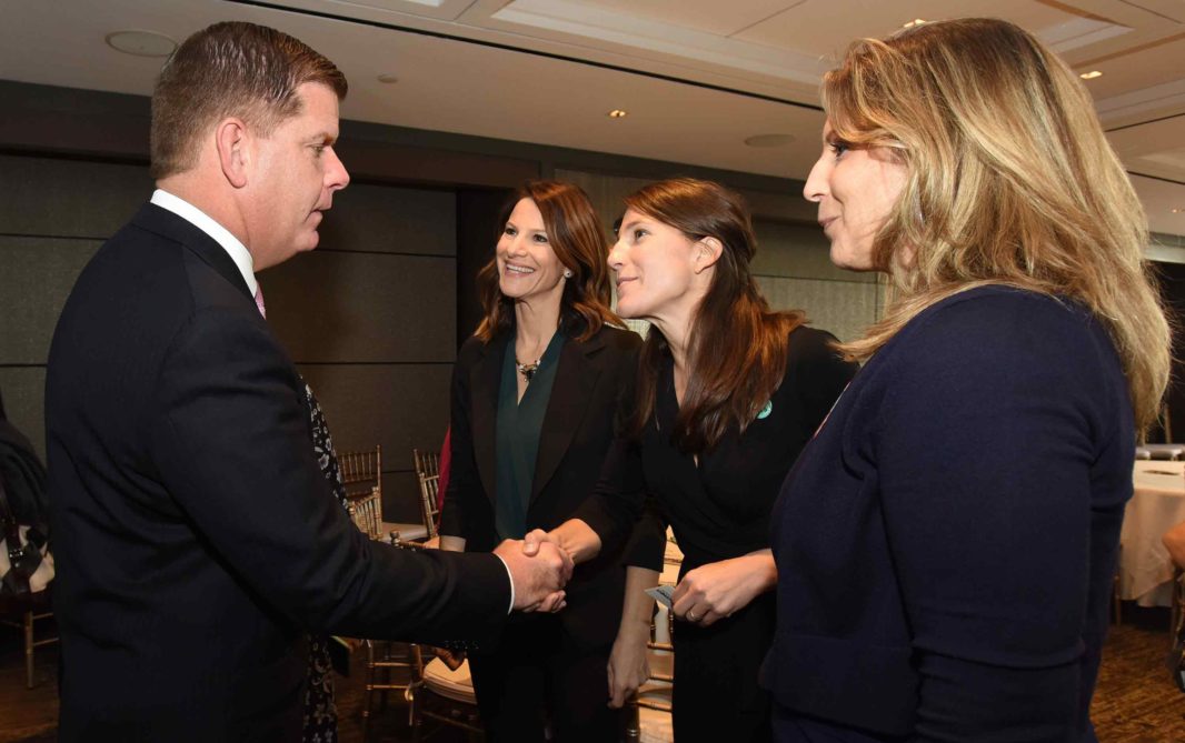 Mayor Marty Walsh shaking the hands of members of the iFundWomen team, a partnership that was launched at the last WE BOS Week