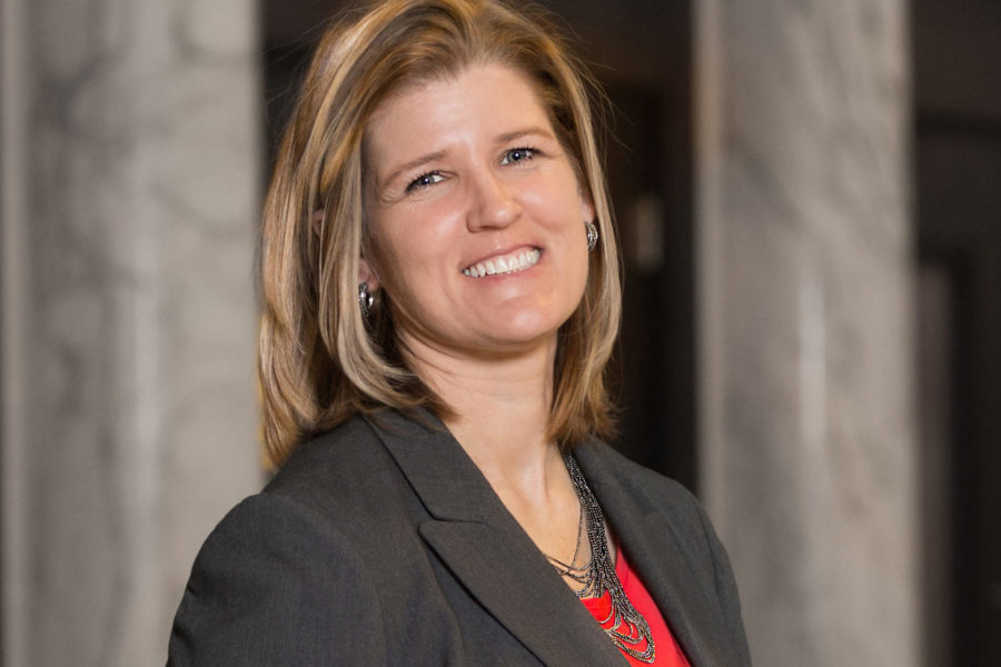 Tracy Lovvorn campaign photo with red shirt and black blazer