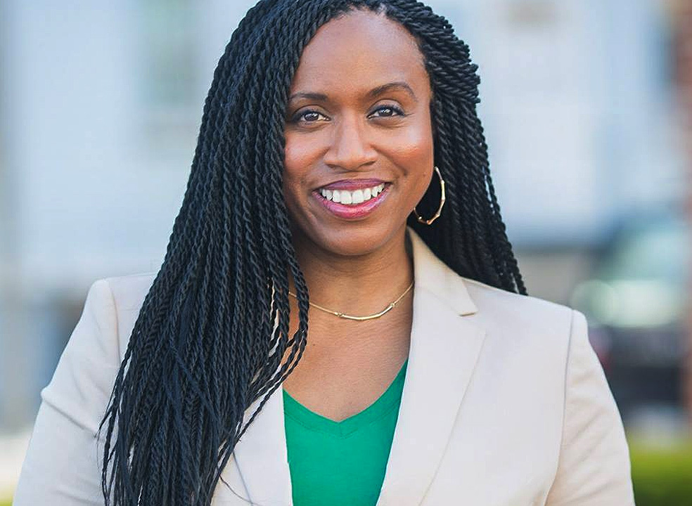 Ayanna Pressley campaign photo green shirt tan blazer