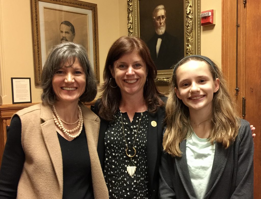 Kim Berntsein with daughter Sofia Bernstein on either side of Cambridge City Councilor Alanna Mallon